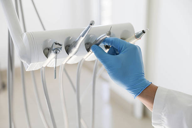 Professional Tooth Extraction technician working in Gladwin County County, MI